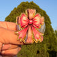 Cross with pink bow E-Reader/Phone Grip